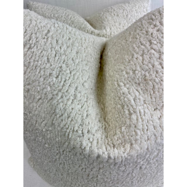 Custom pair of 22” pillows covered in an off white Sherpa wool. These pillows have tapered corners to prevent dog ears,...