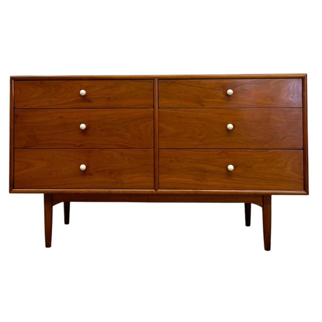 This vintage mid century modern dresser is part of the Declaration collection designed by Kipp Stewart for Drexel.The...
