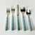 1970s Vintage Boho Chic Contemporary Stainless Steel French Blue Handle Flatware - Set of 20, Service for 4 For Sale - Image 11 of 11
