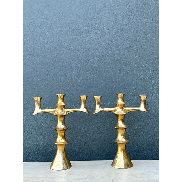Bring a touch of raw architectural drama to your interior with this striking pair of vintage Brutalist candelabras....
