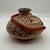 This handcrafted Native American pottery is and authentic piece from the Jemez Pueblo in New Mexico, created by artist...