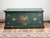 A striking late 19th century English sea chest, richly decorated with bold painted motifs that speak directly to its...