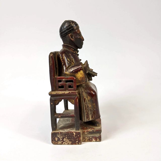 Chinese Early 19th Century Chinese Wooden Figurine of a Scholar Holding a Book For Sale - Image 3 of 7