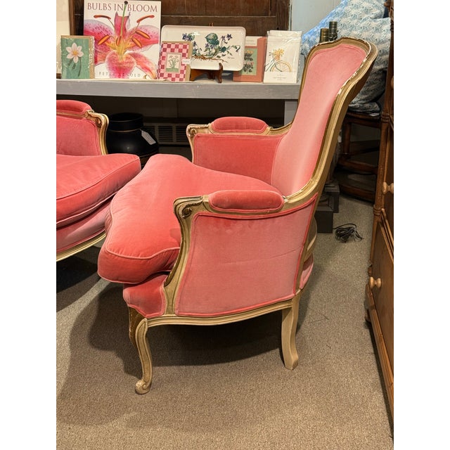 Beautiful antique French provincial Bergere chairs with lush velvet, upholstery, naturally distressed finish on frame and...