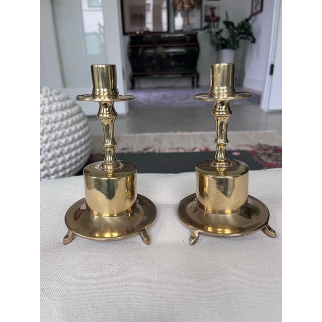 Beautiful set of brass taper holders in a nautical style. A gorgeous addition to your coastal aesthetic or mid-century den.