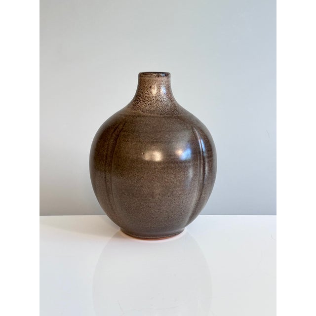 A decorative, handcrafted, free-thrown studio ceramic vase by Kristian Körting (1949-2020) with a harmoniously rounded...