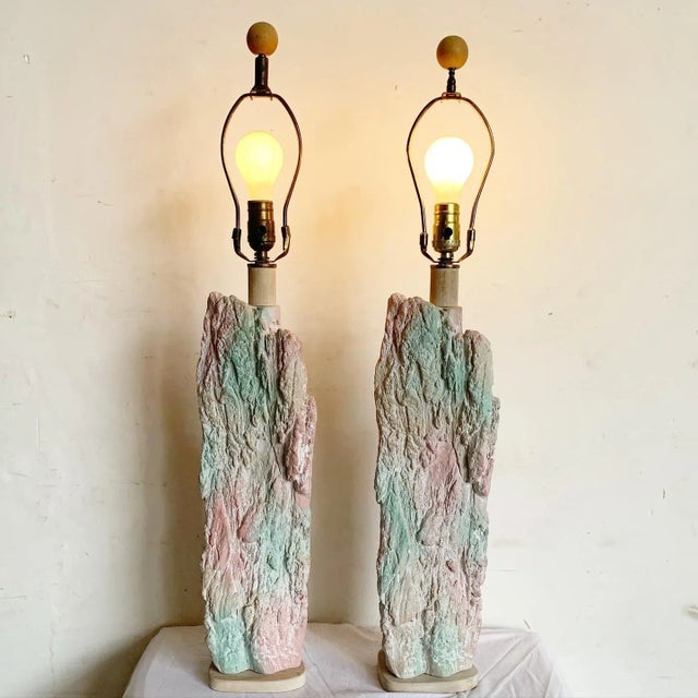 From the 1980s, this Southwest Pottery Vase is a vibrant representation of the era's artistry. Its primary green hue sets...