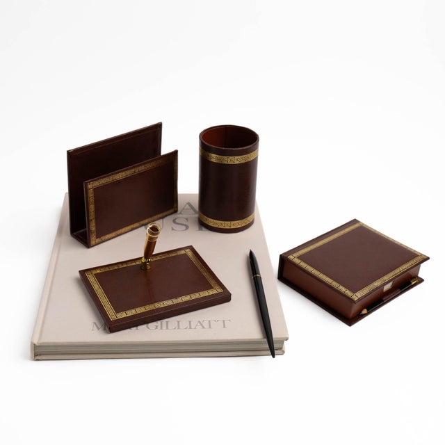 Vintage brown leather desk accessory set, 4 pieces. Includes a pen/pencil holder cup, letter holder, notepad holder with...