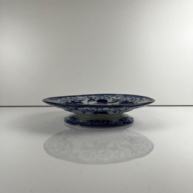 Ironstone Plate on a Footed Base "Flora" – Creil and Montereau, 19th Century, Blue Fine earthenware/ironstone plate...