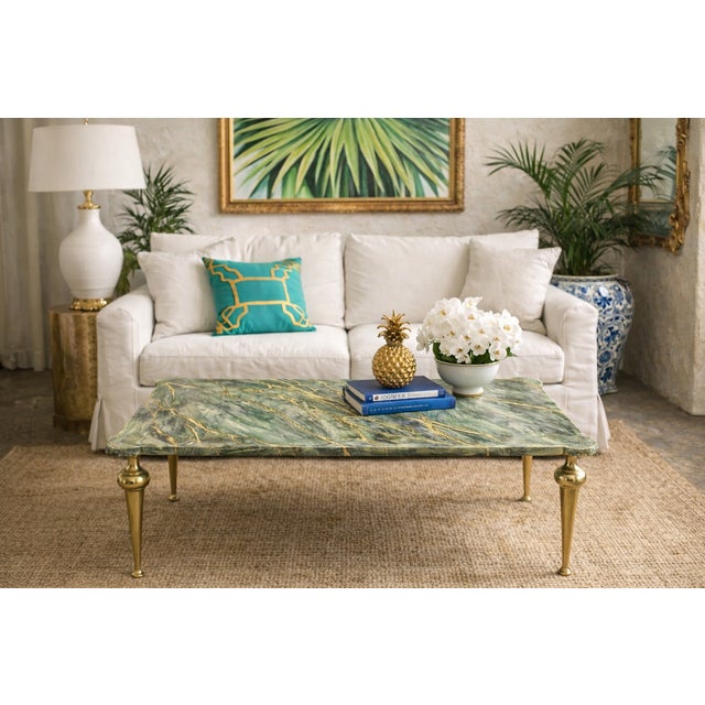 A chic and sophisticated Italian coffee table from the mid-20th century. This piece features a beautifully hand-painted...