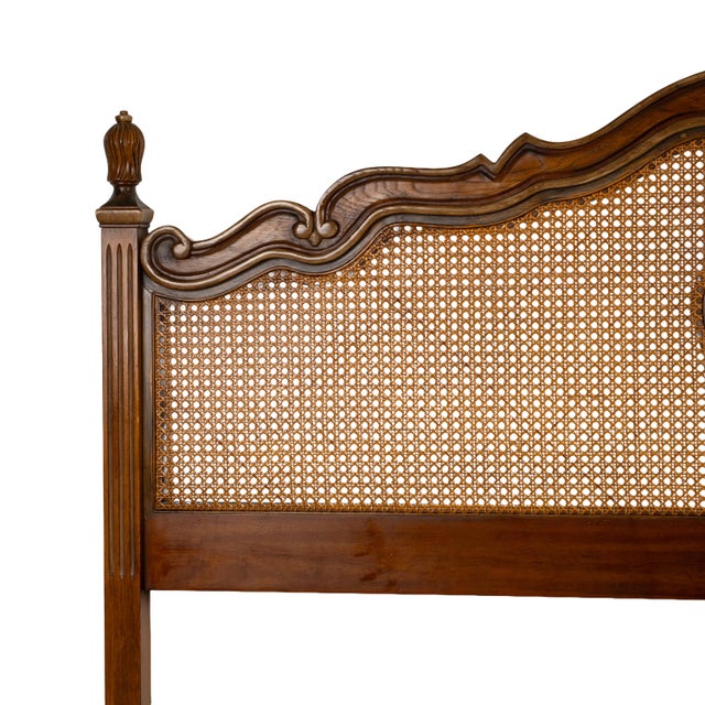 Drexel Heritage Brittany collection headboard featuring a classic French provincial design with carved wood detailing and...