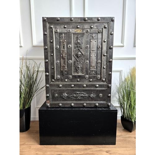 Beautiful and rare example of late 18th century Italian master blacksmith craftsmanship, this antique studded safe with...