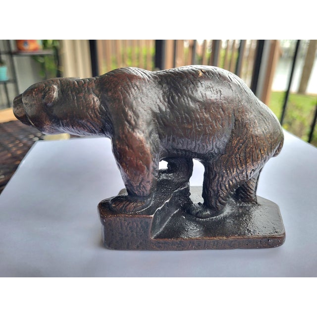 Stunning, heavy bronze sculpture of a California Grizzly Bear, dating to the Arts & Crafts period (c. 1910). This piece...