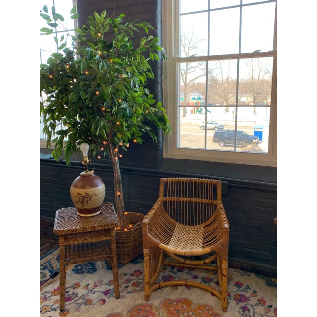 This vintage bamboo chair is one-of-a-kind with its uniquely woven seat. Crafted with meticulous attention to detail and...