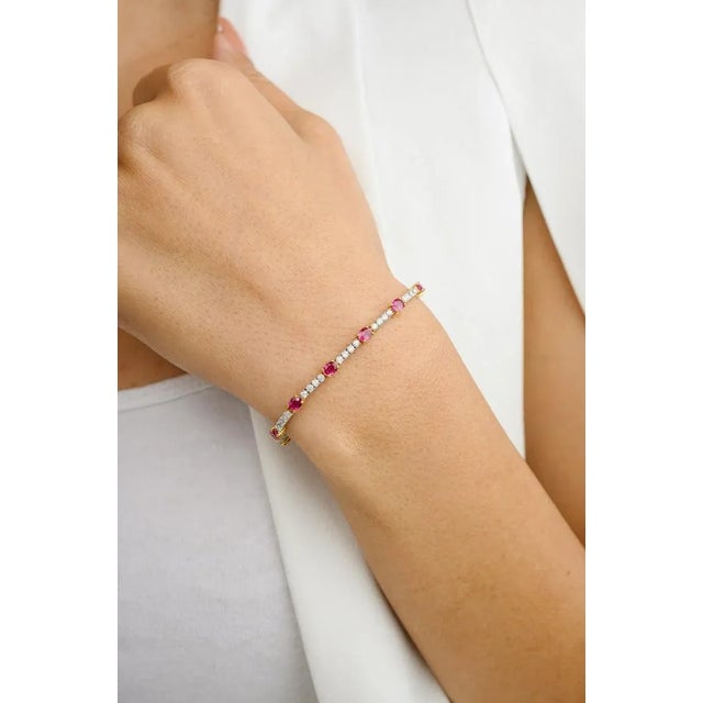 This is part of Chairish’s Fine Jewelry assortment. This Genuine Ruby Diamond Engagement Bracelet in 18K gold showcases...