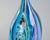 Found in Italy, this Murano glass sculpture dates from approximately 2010. Although this vase-form piece has a pinhole-...