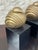 Pair of vintage sculptural bird bookends featuring stylized brass birds with beautifully detailed, sweeping feather...