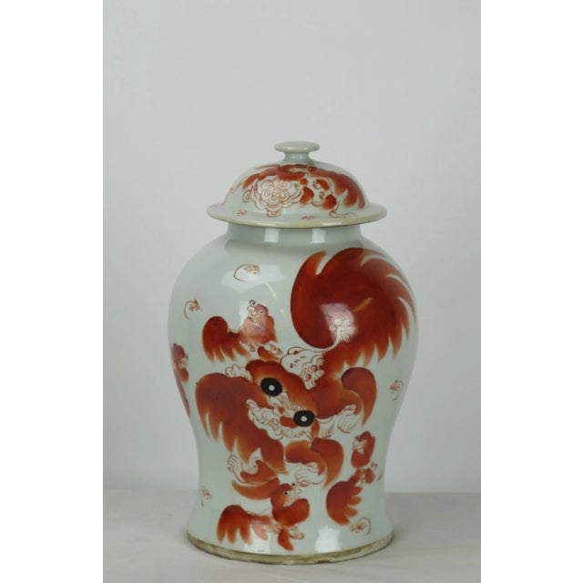Handmade and painted red dancing lion jar. Antiquing process applied gives this lovely ginger jar a true antique look....