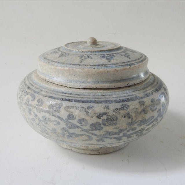 16th century lidded jar from the Si Satchanalai (Sawankalok) region of north-central Thailand. Stoneware with underglaze...