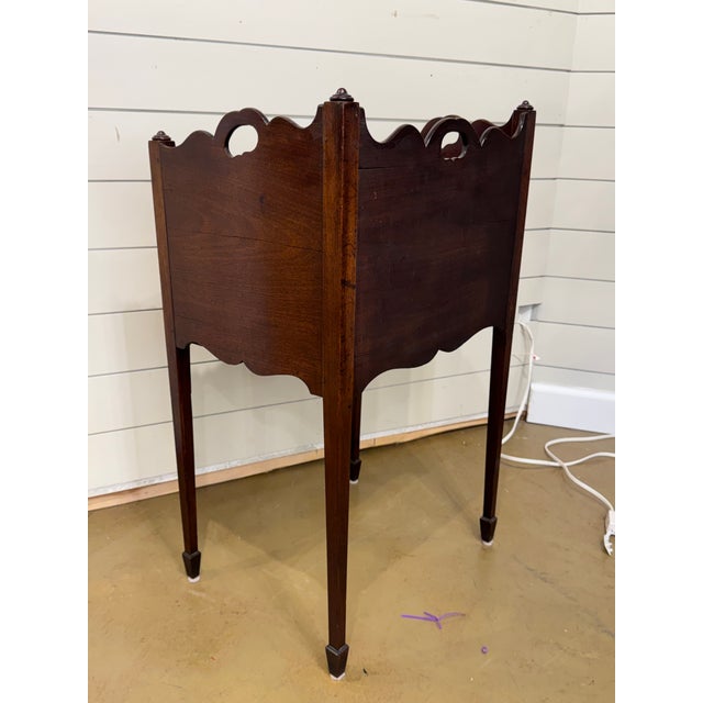 This is a lovely 19th Century George III bedside table from England. Often called a tray top commode, it has amazing...