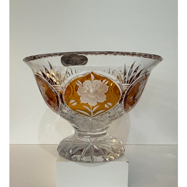A striking vintage Julia (Poland) hand-cut lead crystal centerpiece bowl, rendered in richly saturated amber cut-to-clear...