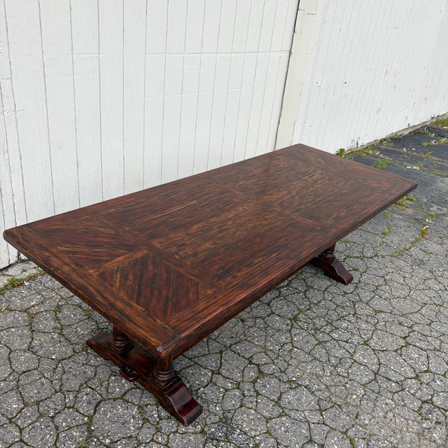 Handsome large refectory dining table, crafted in the traditional English manner with a richly figured plank top above a...