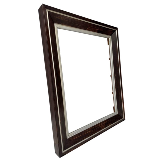 Stunning and elegant Art Deco picture frame.Striking Dutch design from the 1930s. Original solid macassar ebony and...