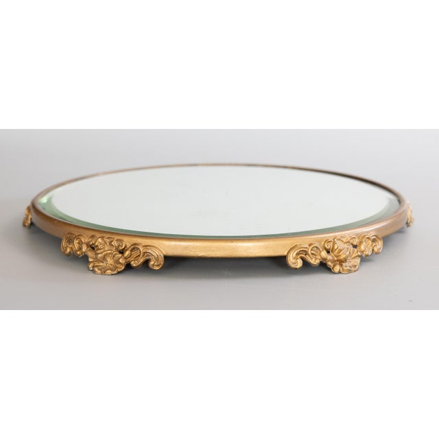 A superb antique French Art Nouveau style gilt metal mirrored table plateau dresser tray. This gorgeous tray retains the...