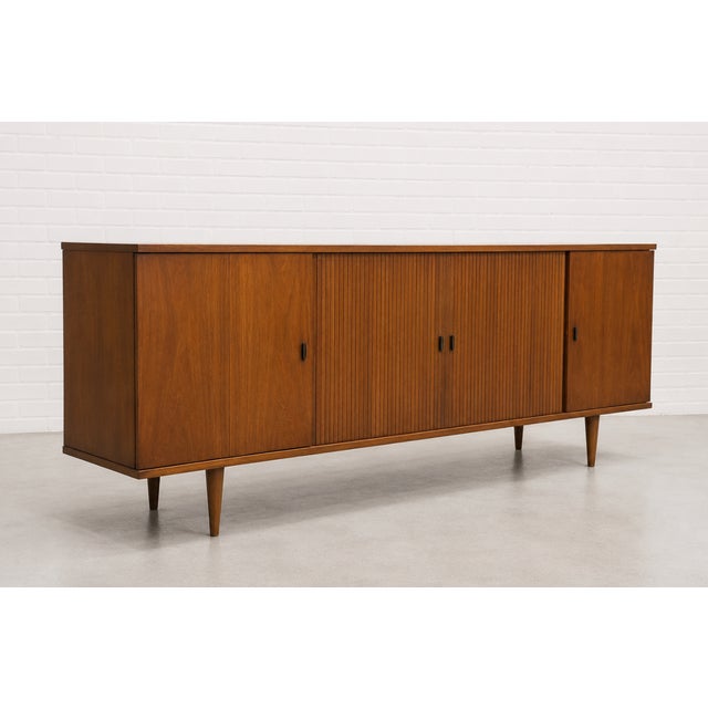Extra Long and superbly incredible Mid Century Modern Stereo Cabinet / Credenza, c. 1960's. This custom made walnut...