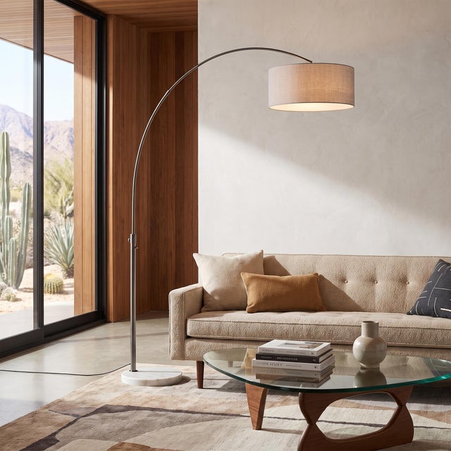 The lamp that lights a whole seating area without a single hole in your ceiling. The Float Arc Lamp is a modern...