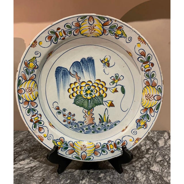 18th century English delft polychrome charger.