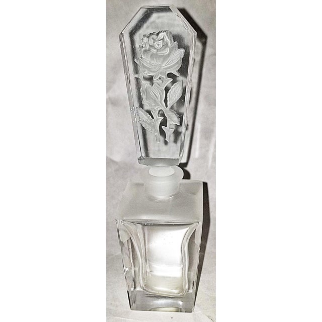 Elegance with 20th c. modernism, a 1940s intaglio etched perfume bottle in crystal glass.