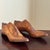 A charming pair of antique wooden shoe lasts dating to the early 20th century. Hand-carved from hardwood and beautifully...