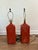 Gorgeous pair of ceramic lamps in a burnt orange color.
