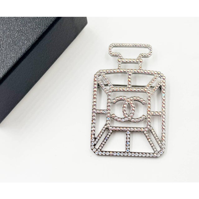 Chanel Silver CC Iridescent Crystal Large Bottle Brooch *Marked 17 *Made in Italy *Comes with the original box -It is...