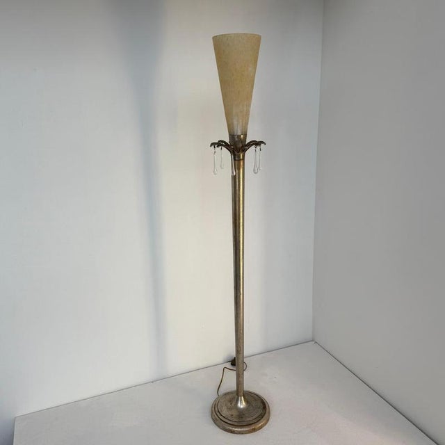 Mid century italian floor lamp in patinated brass and murano glass shade 1950s a slender floor lamp composed of a tubular...
