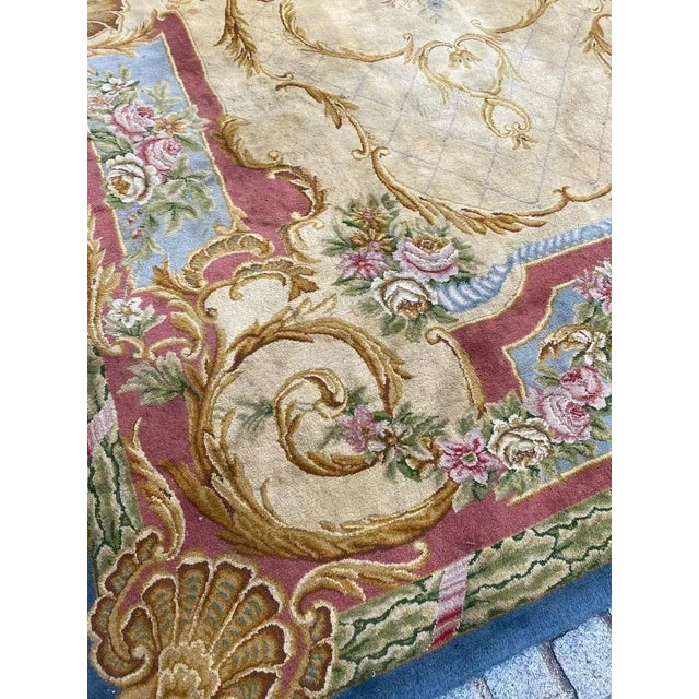 Very beautiful and fine over size Savonnerie rug with a floral design of Louis 16th and beautiful colors, entirely and...