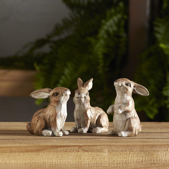 Bring the charm of spring into your home or garden with this delightful set of carved stone rabbit figurines. Made from...