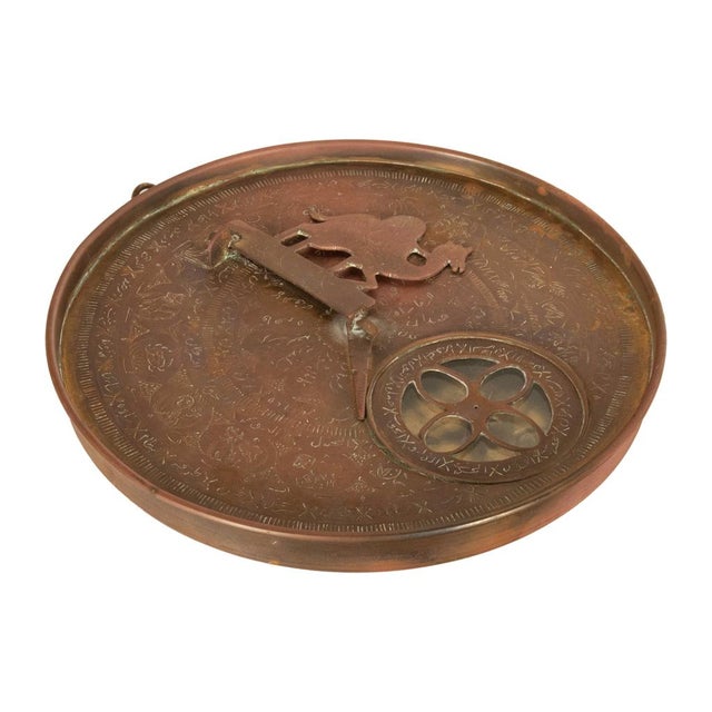 A good antique 19th century Persian Islamic brass astrolabe compendium, circa 1880. This rare antique Islamic scientific...