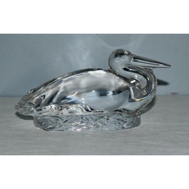 Vintage (1970's) Nesting Stork is French. Made by Baccarat. The Crystal is Clear. Signed. The Measurements: 5.5"W x 2"D x...