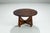 This expressive round coffee table was designed by Angel Pazmiño and produced by Muebles de Estilo in Ecuador, circa 1960....