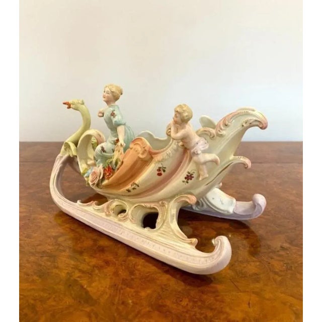 Antique Victorian quality porcelain group with a lady riding a swan carriage, wonderful colourful hand painted decoration.