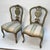 Charming pair of polychrome painted, carved and parcel gilt upholstered chairs. Beautiful color and patina. Upholstered in...