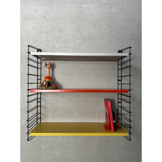 Vintage Tomado Holland rack with metal shelves. Metal holders with the possibility of expansion. Shelf holders and shelves...