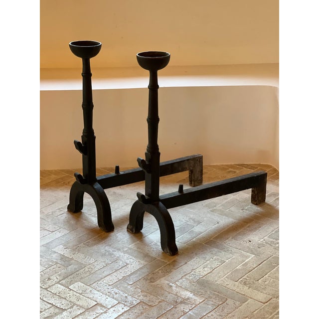 Pair of kitchen andirons, each with a container and side hooks, made of cast iron, 19th century. French folk art,...