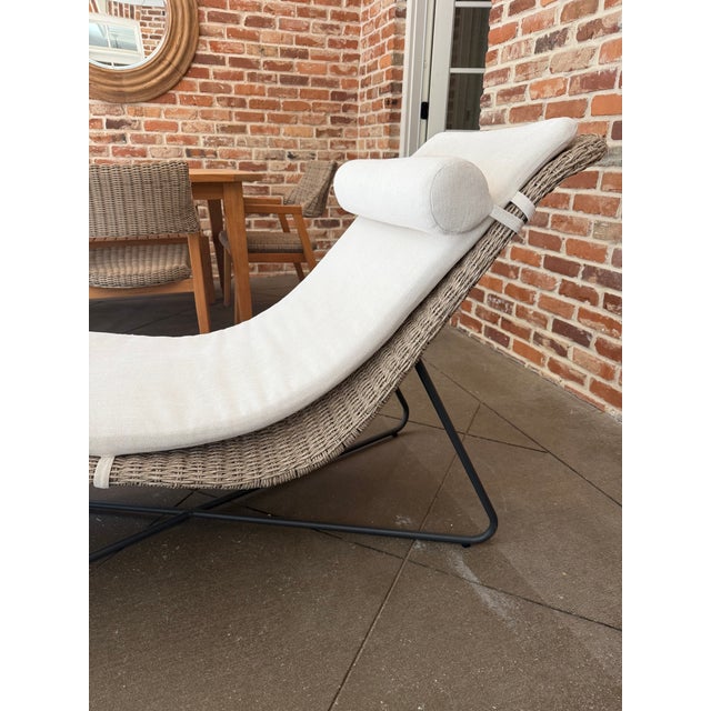 Great chaise in all-weather resin wicker on top of a steel base in a matte black finish. Contoured cushion is upholstered...