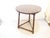 This English oak cricket table has a pegged construction and a lightly carved apron and measures 30"H x 26.5"Diameter.