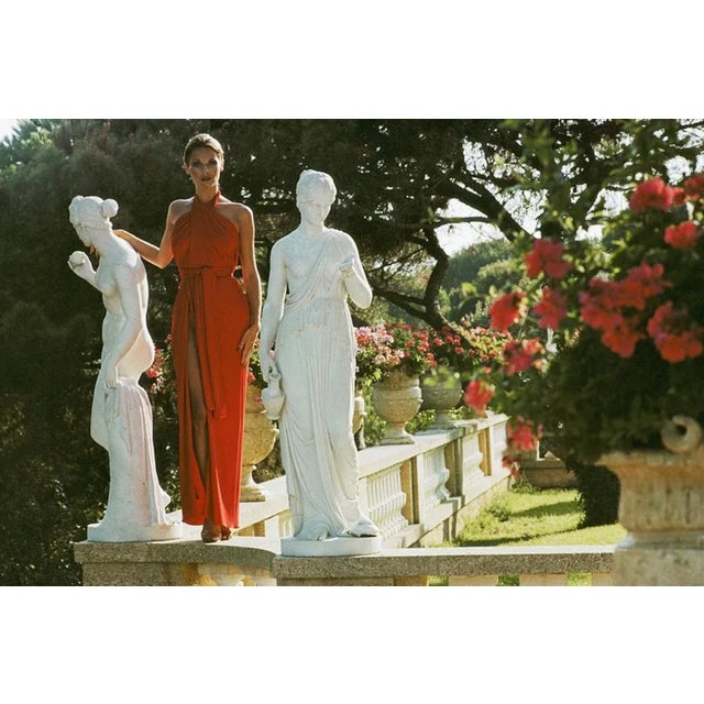St Tropez Garden 1977 by Slim Aarons Slim Aarons Limited Estate Edition An elegant woman poses in a garden in St Tropez,...
