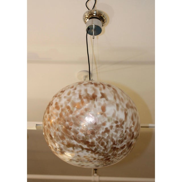 Large 1970s modern Murano glass pendant with chrome hardware, newly rewired and ready to use.