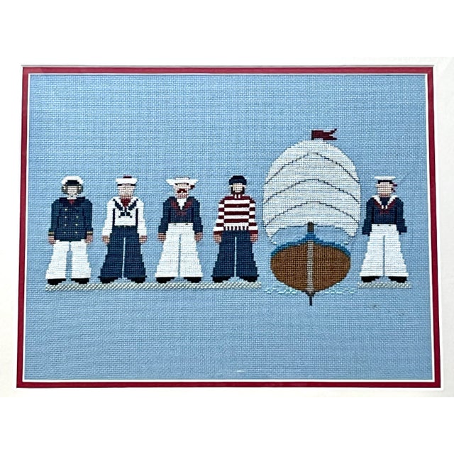 Vintage maritime sailors and ship original cross-stitch work, matted and framed. The mid-blue textile provides the perfect...